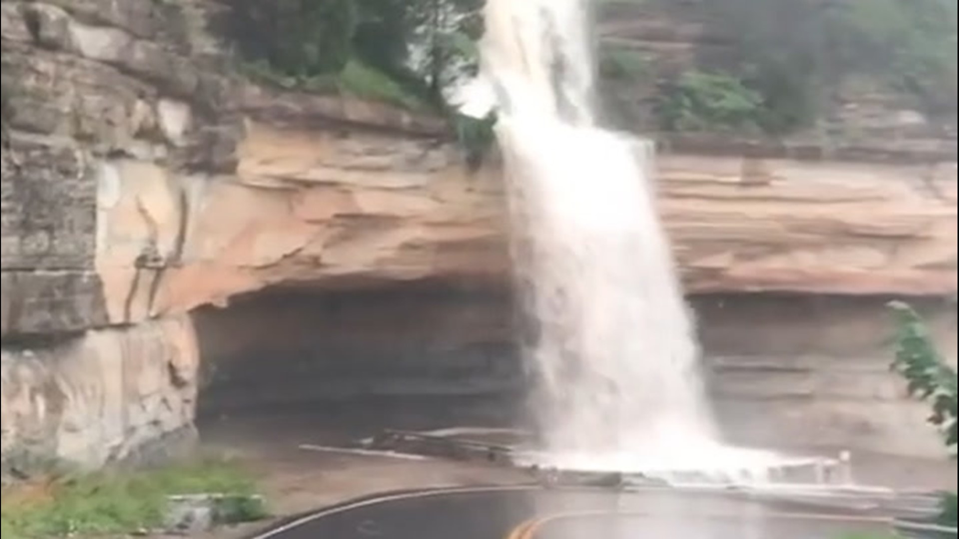 On July 31, powerful flooding slammed into a road in Madison, Indiana, in the shape of a waterfall after it cascaded off a cliff.