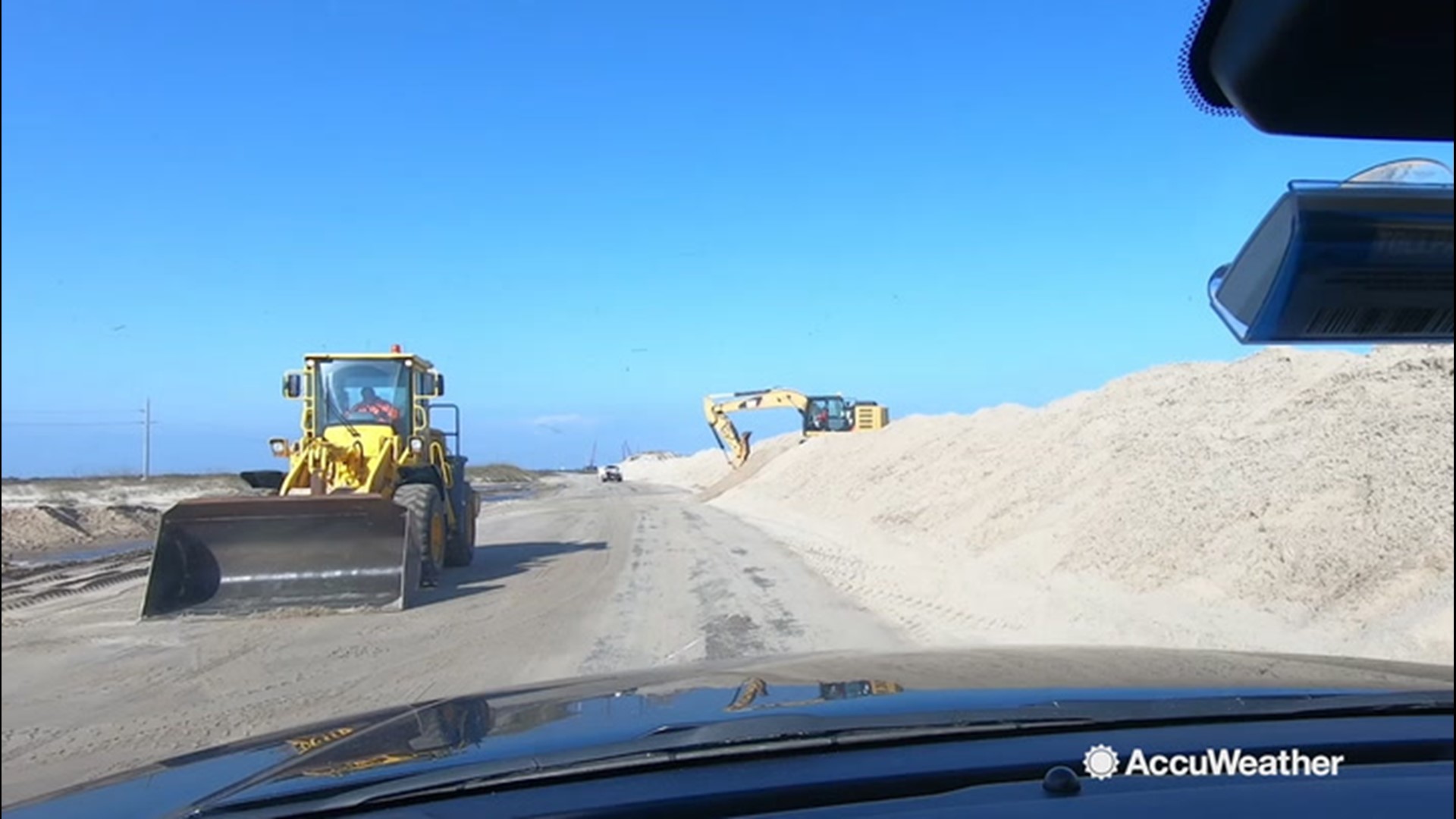 Highway 12 is reopened north of Rodanthe, North Carolina, after being closed since Saturday, because of sand and water on the road after a powerful coastal storm.