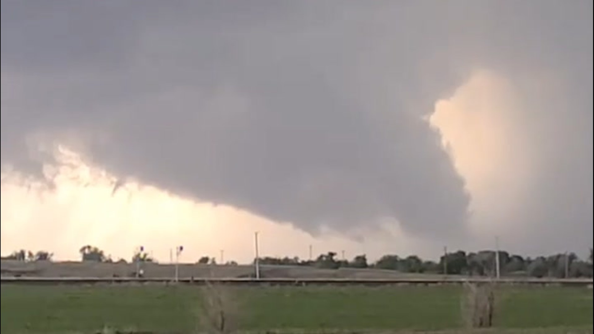 This possible tornado forming over Holly, Colorado, triggered tornado sirens to sound. There were multiple reports of tornadoes in the area on May 21.