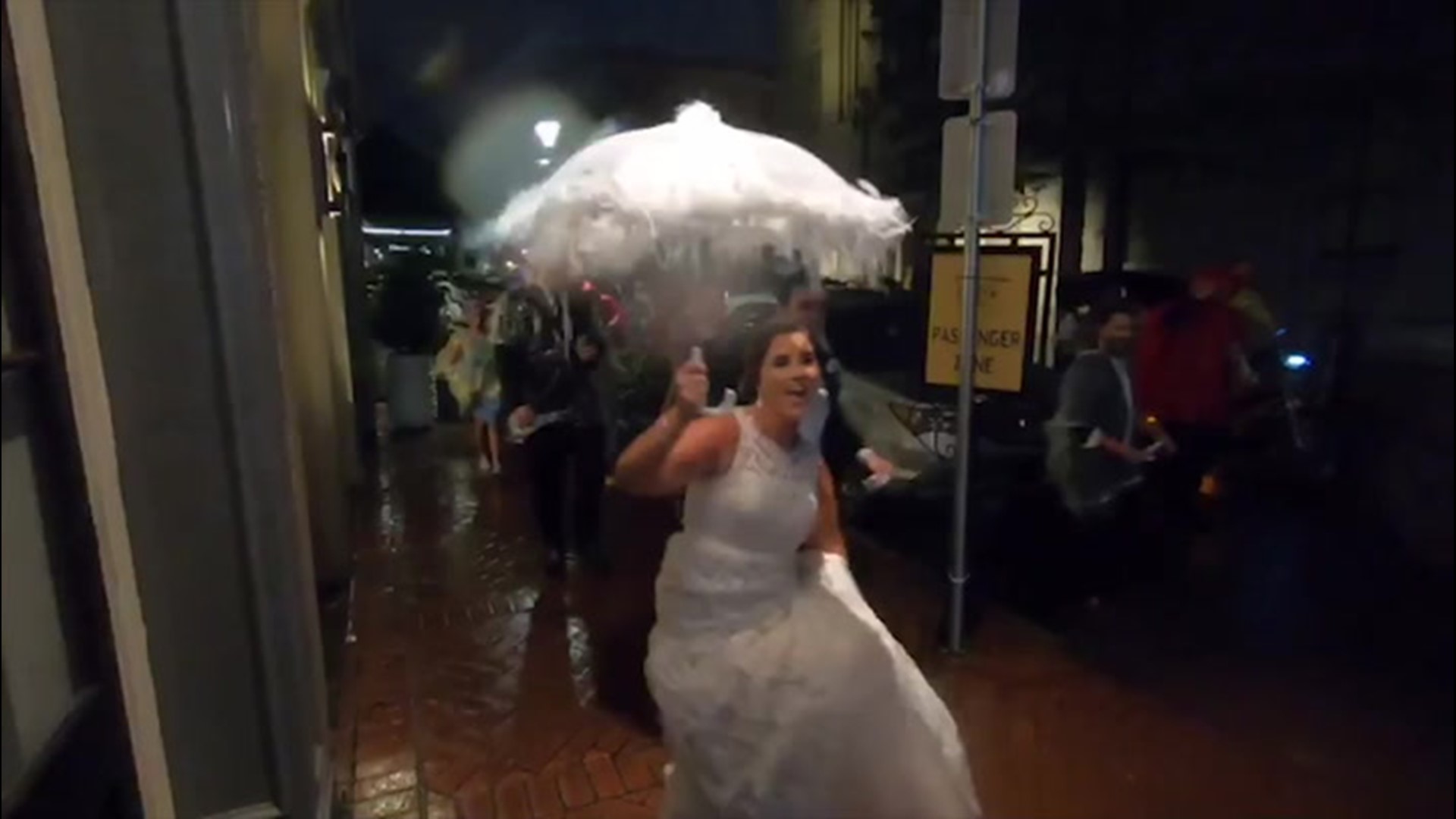Despite rainy conditions brought by Barry, it didn't stop these newly weds from parading through the streets of New Orleans, Louisiana on July 13.