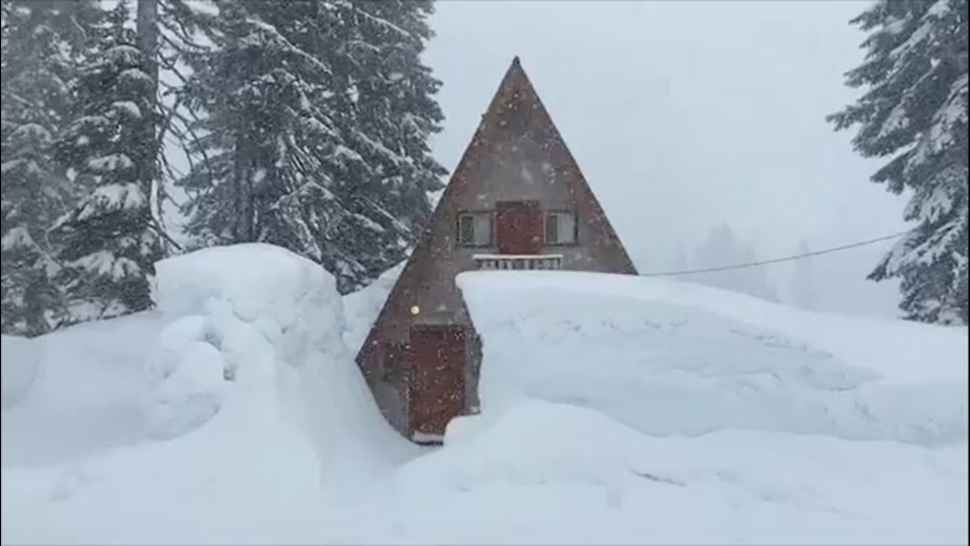 A cabin in Stevens Pass, Washington, was practically buried by heavy snowfall on Monday, March 30.
