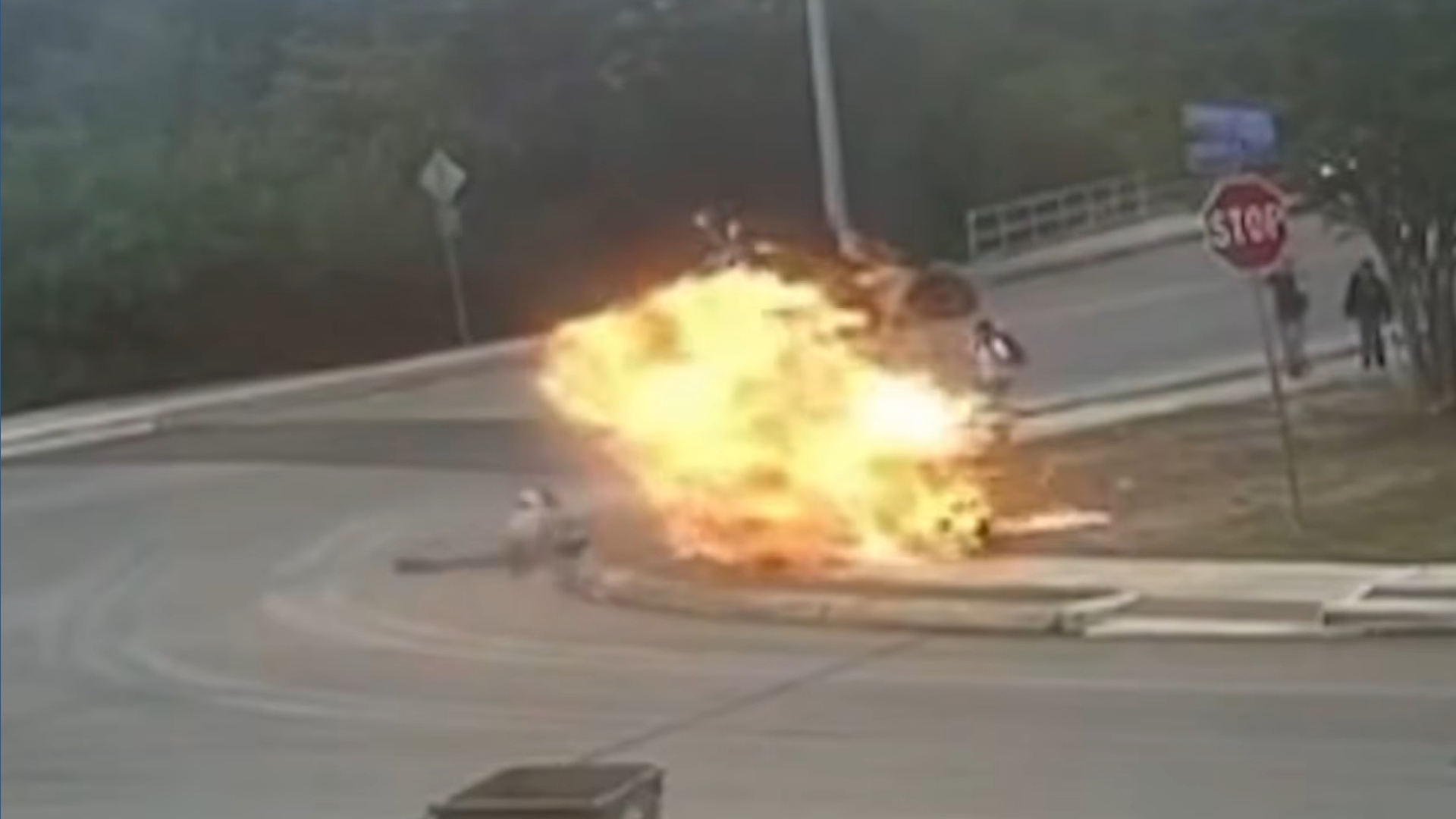 Motorcycle crash, explosion narrowly misses children on sidewalk in ...