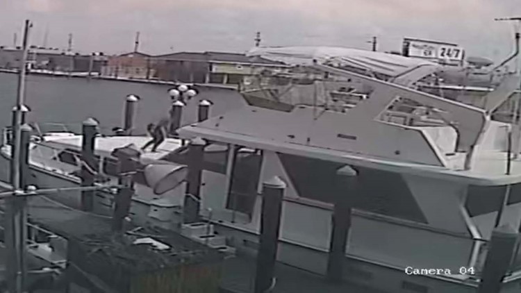 Surveillance video shows woman boarding yacht before allegedly taking it for joyride
