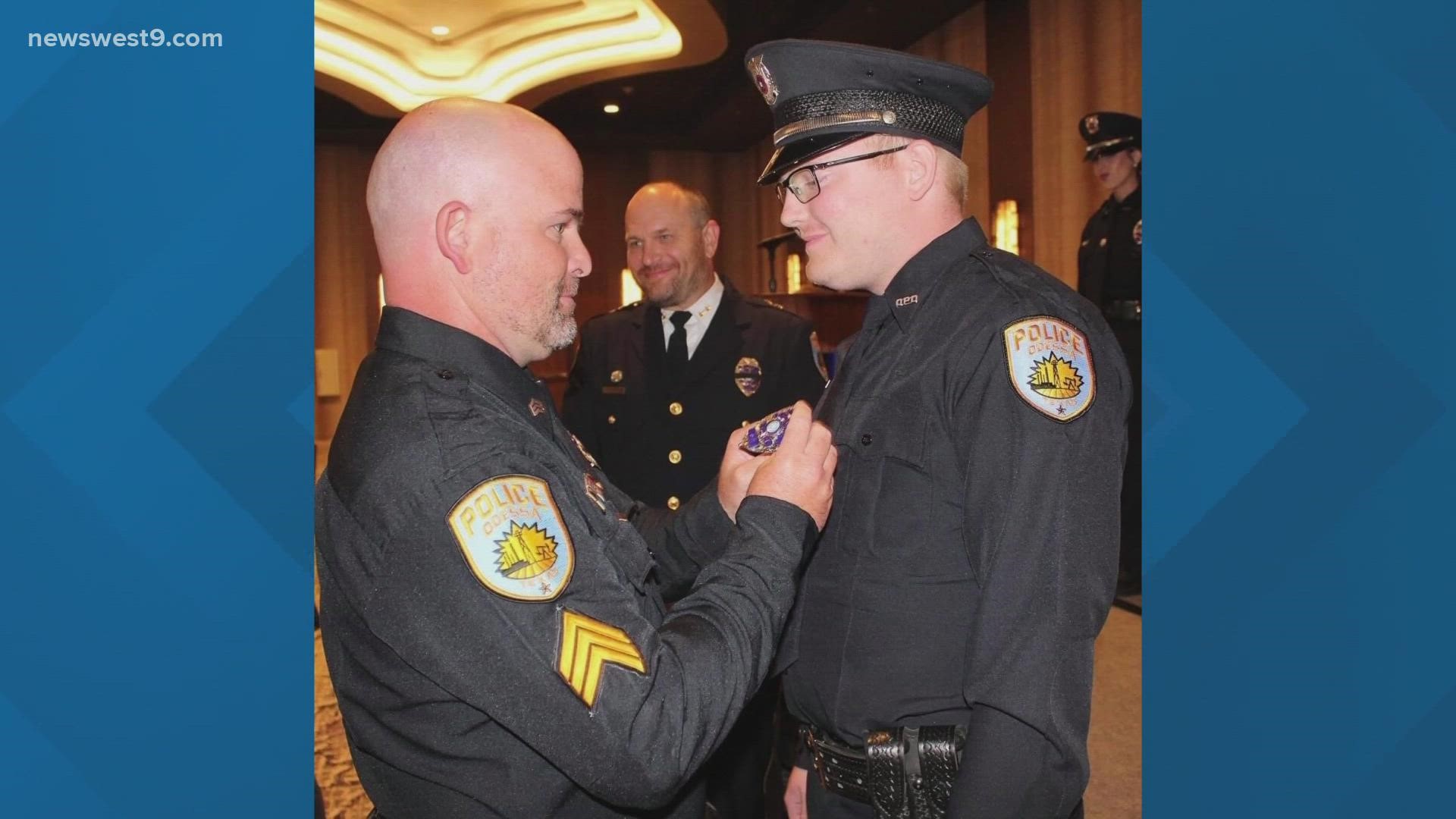 Rusty Martin was there to pin the badge on Taylor following his graduation.