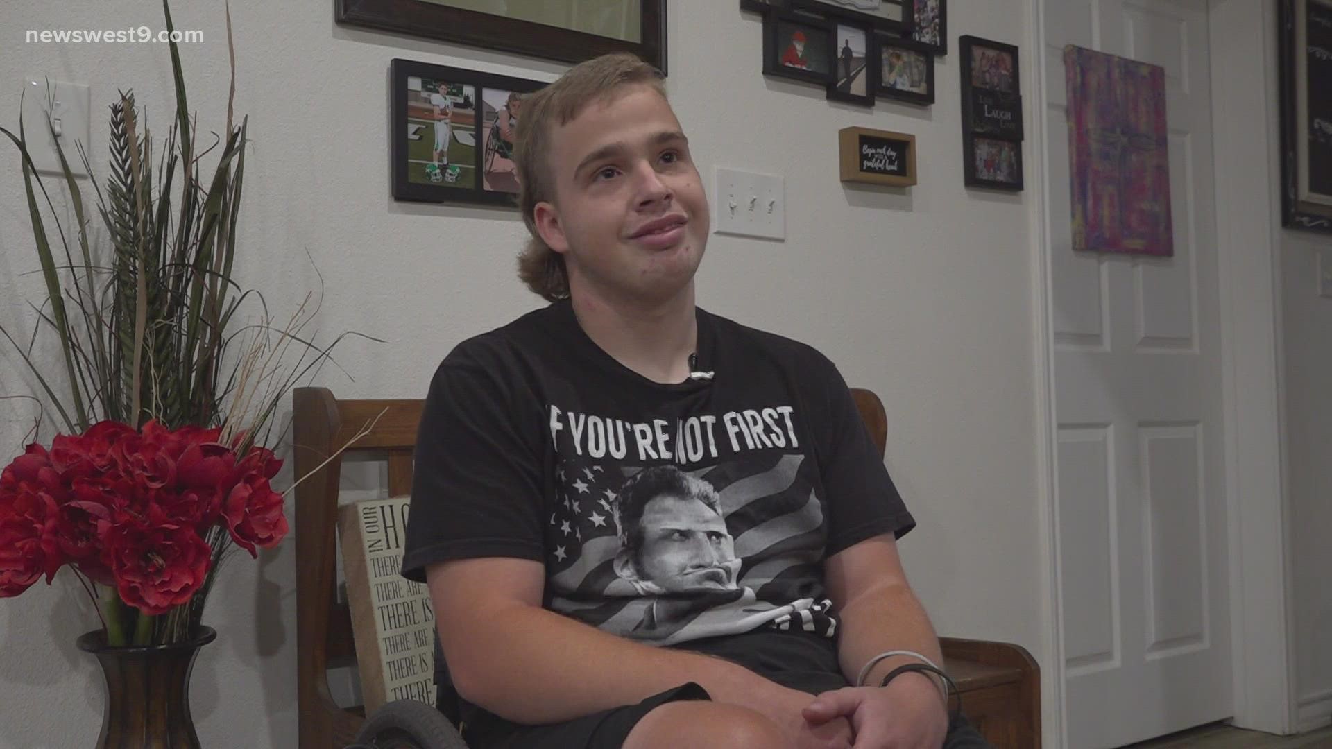 Zachary Carter, who lives with spina bifida, competes in track and field and has played football as well.