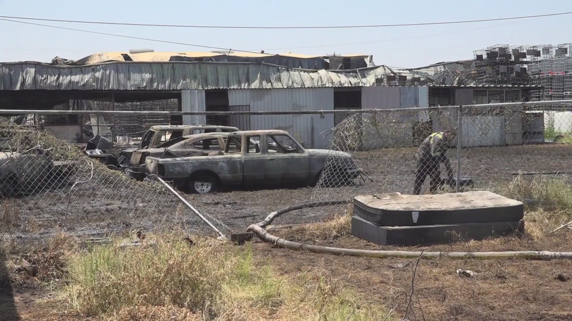 The blaze at Permian Basin Containers has left residue on the property of residents. The TCEQ is investigating as air quality and water issues persist.