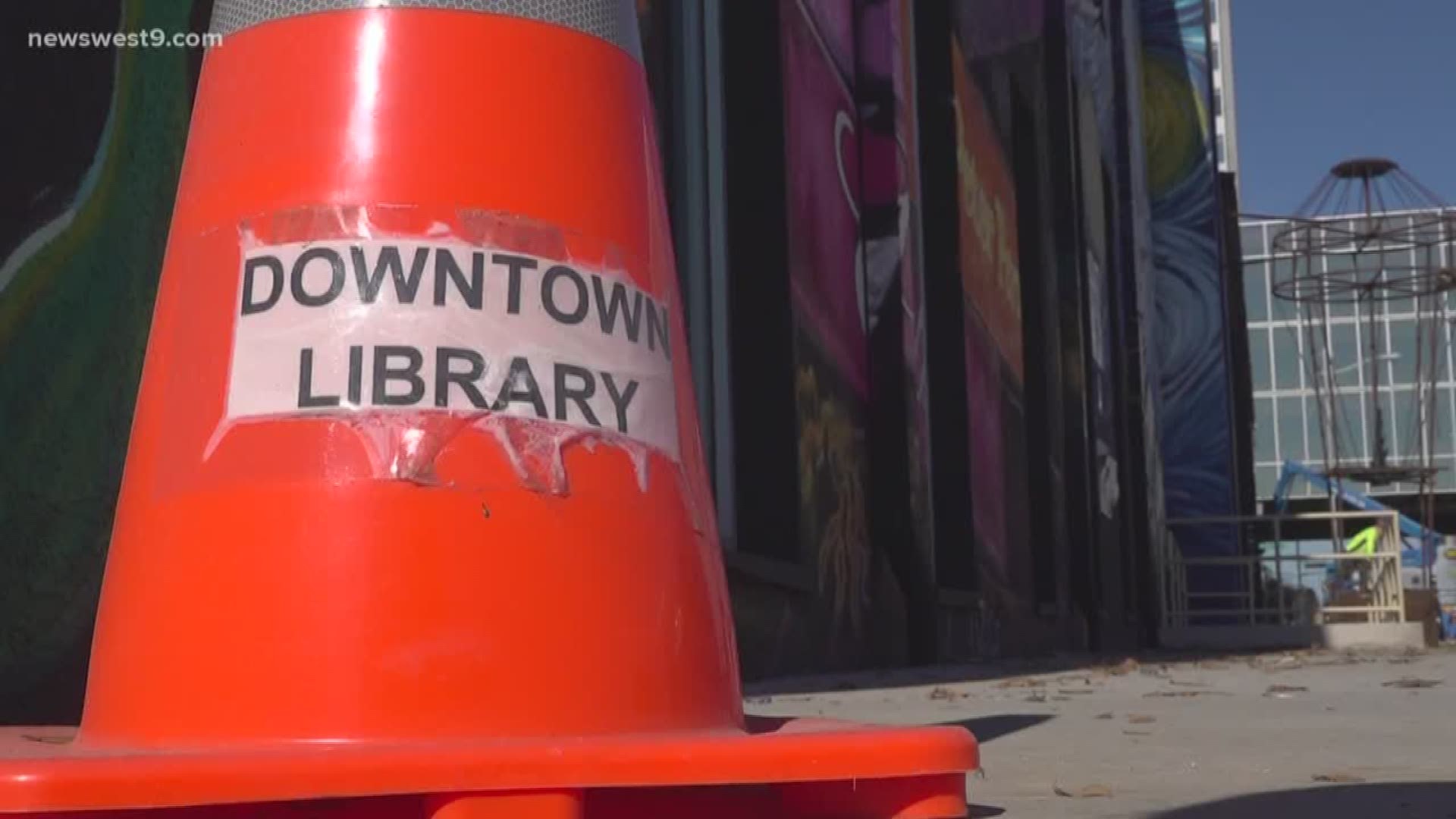 It's all coming from two women artists who decided to team up and create spray paint art and scrap metal sculptures for the library's exterior.