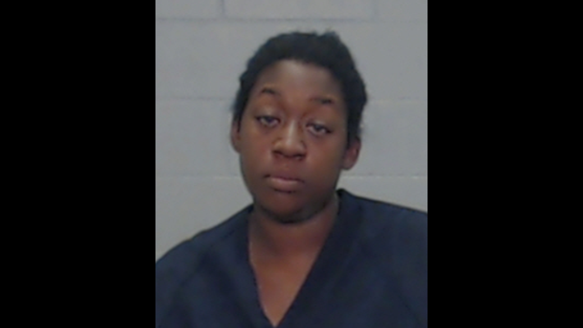 Woman arrested for allegedly trying to run over two after argument