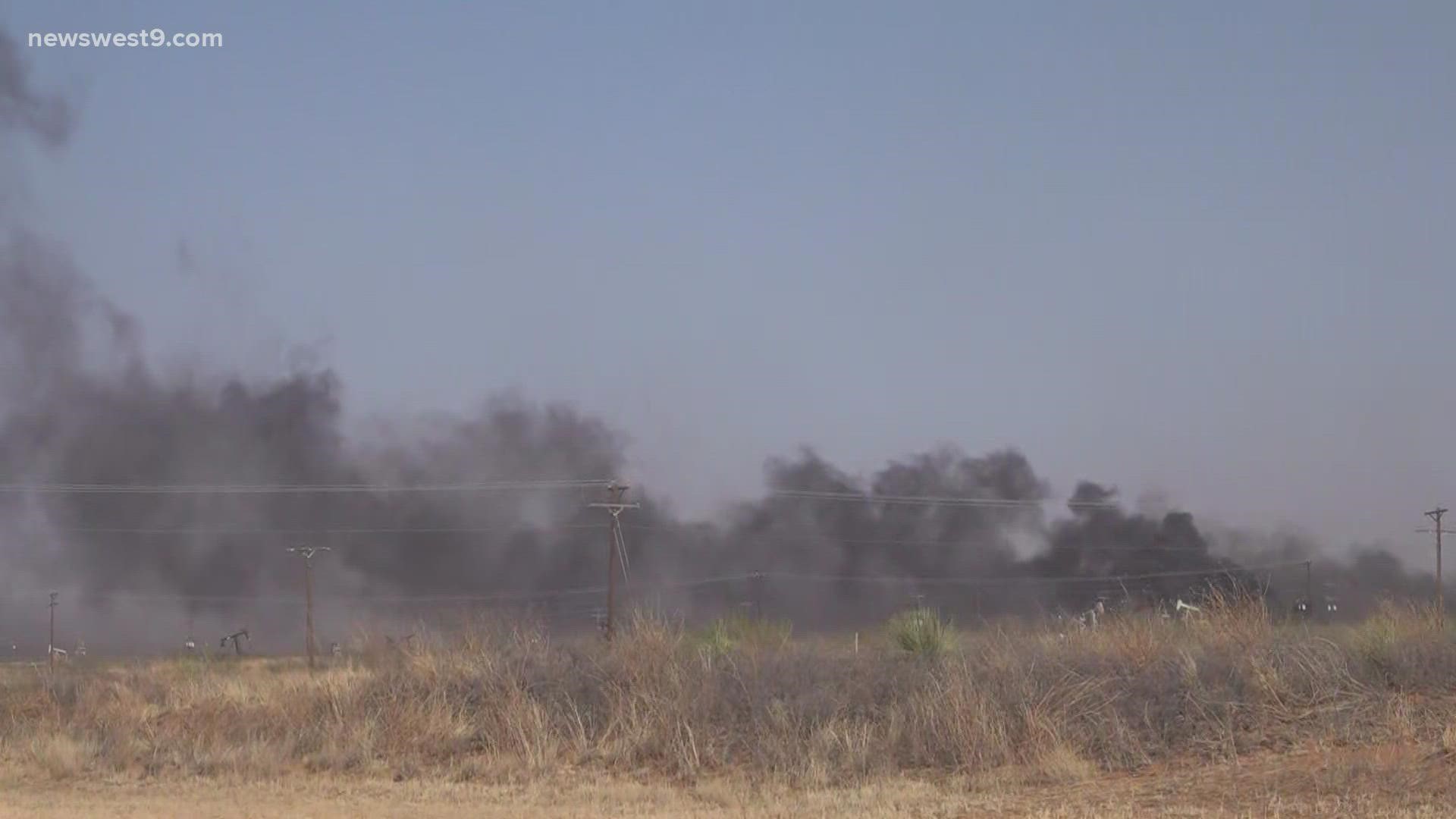 Nearly 40 mile an hour winds are causing the grass fire, located near Highway 115, to spread.