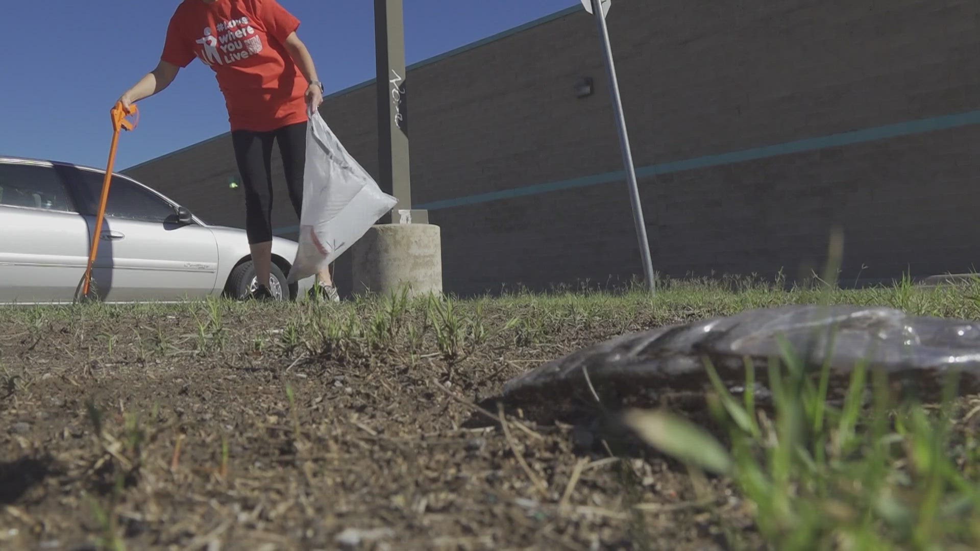 Board members of Keep Midland Beautiful were out cleaning Thursday in Midland bagging up trash around Loop 250 and Midland Dr.