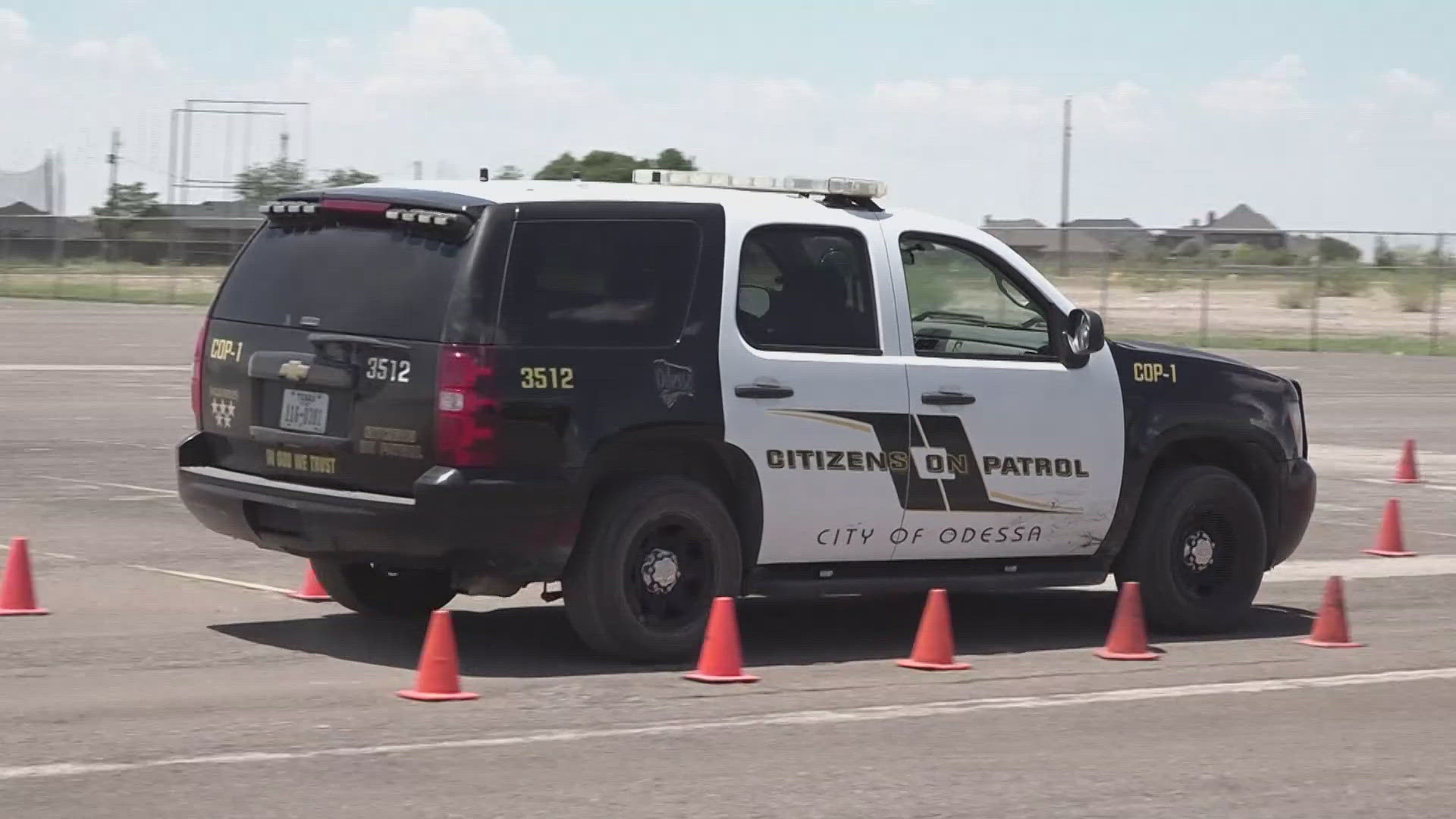 The future officers had to drive patrol cars through an obstacle of cones without hitting any of the cones.