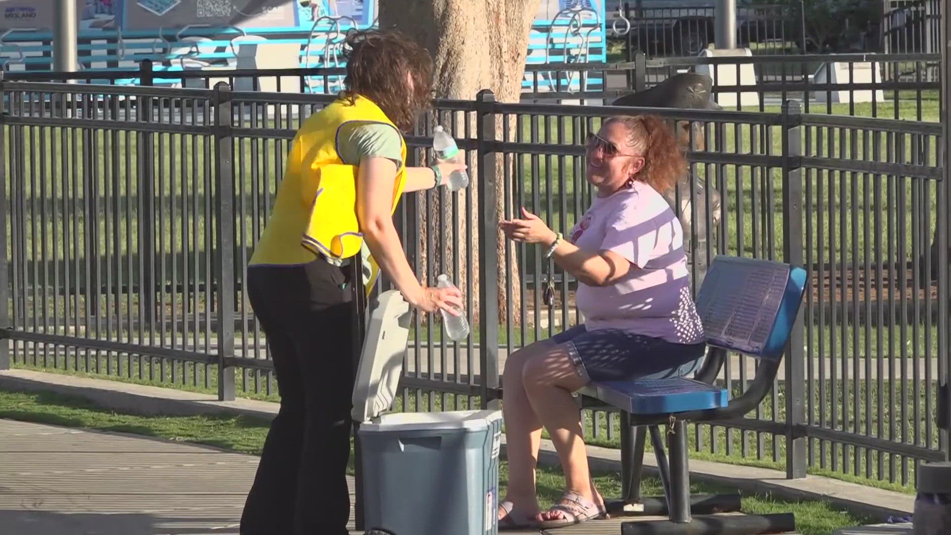 Throughout the summer, every Monday night, the club hands out water bottles to citizens who come by Dennis the Menace Park.