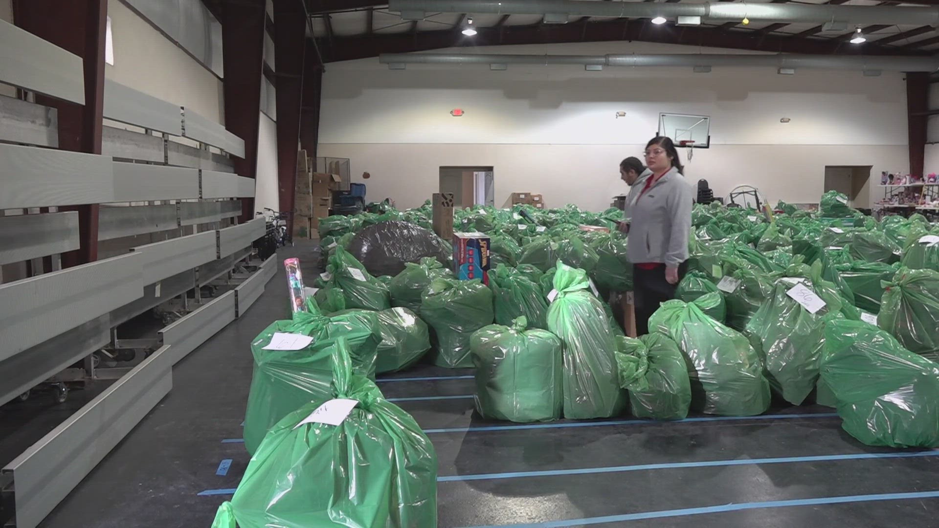 At a Midland warehouse Tuesday, lines of parked cars waited to pick up toys. All the toys came from NewsWest 9's Salvation Army Toy Drive.