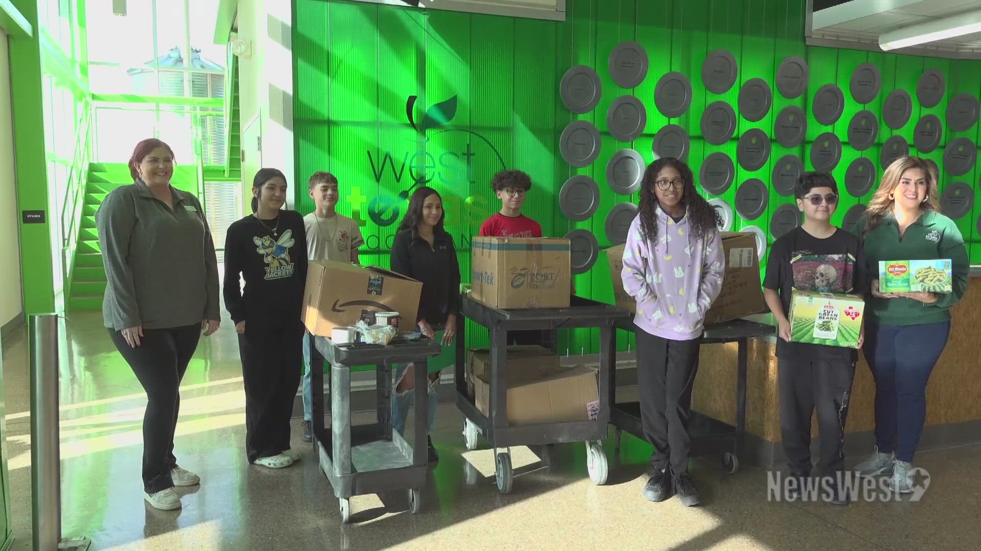 A group of students delivered 300lbs of canned food items donated by community members to the food bank. It comes as the agency has fed more people than ever before.