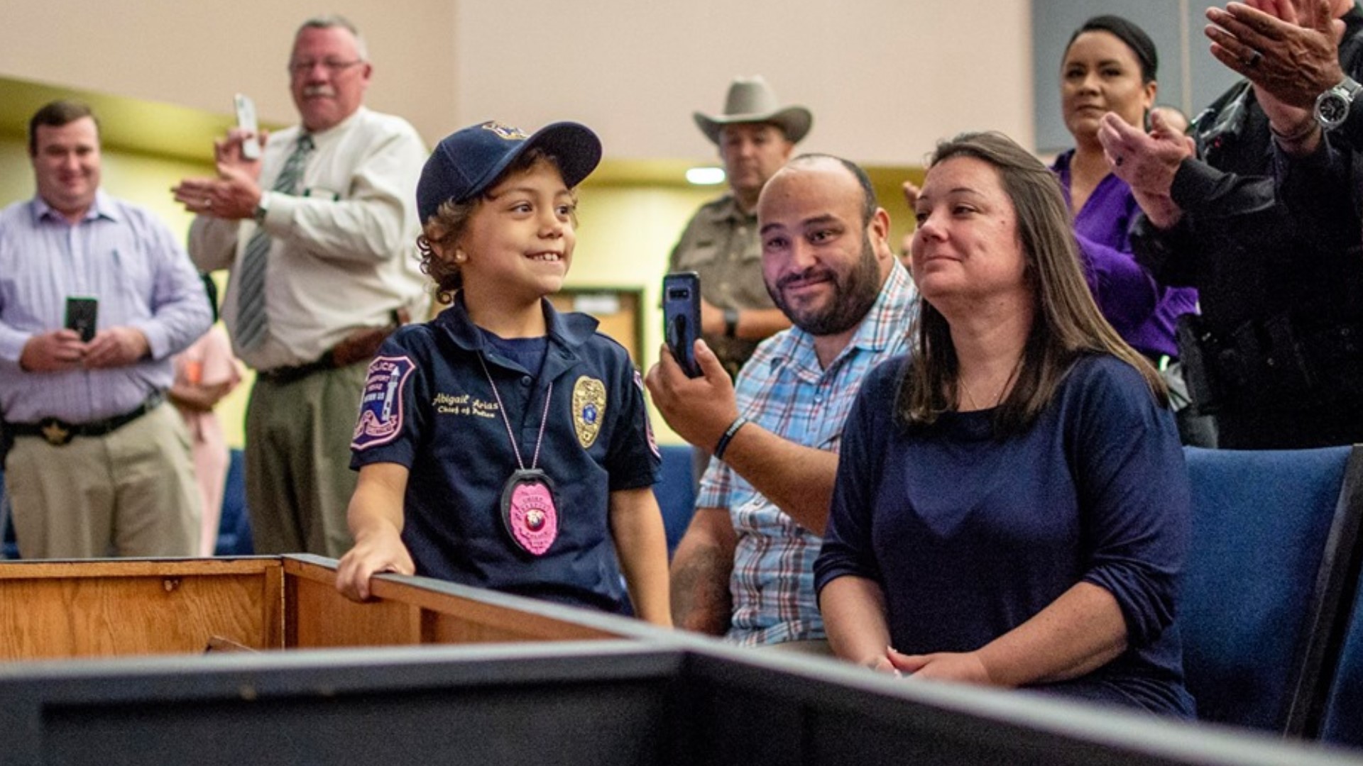 The six year old fighting terminal lung cancer has been sworn in as an honorary peace officer in departments across the nation.