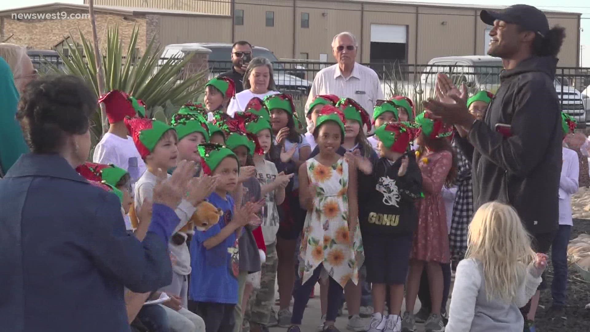 Children were treated to Christmas carols as well as People Pride Scholarship Program founder John Bushman sharing the story and meaning of Christmas.