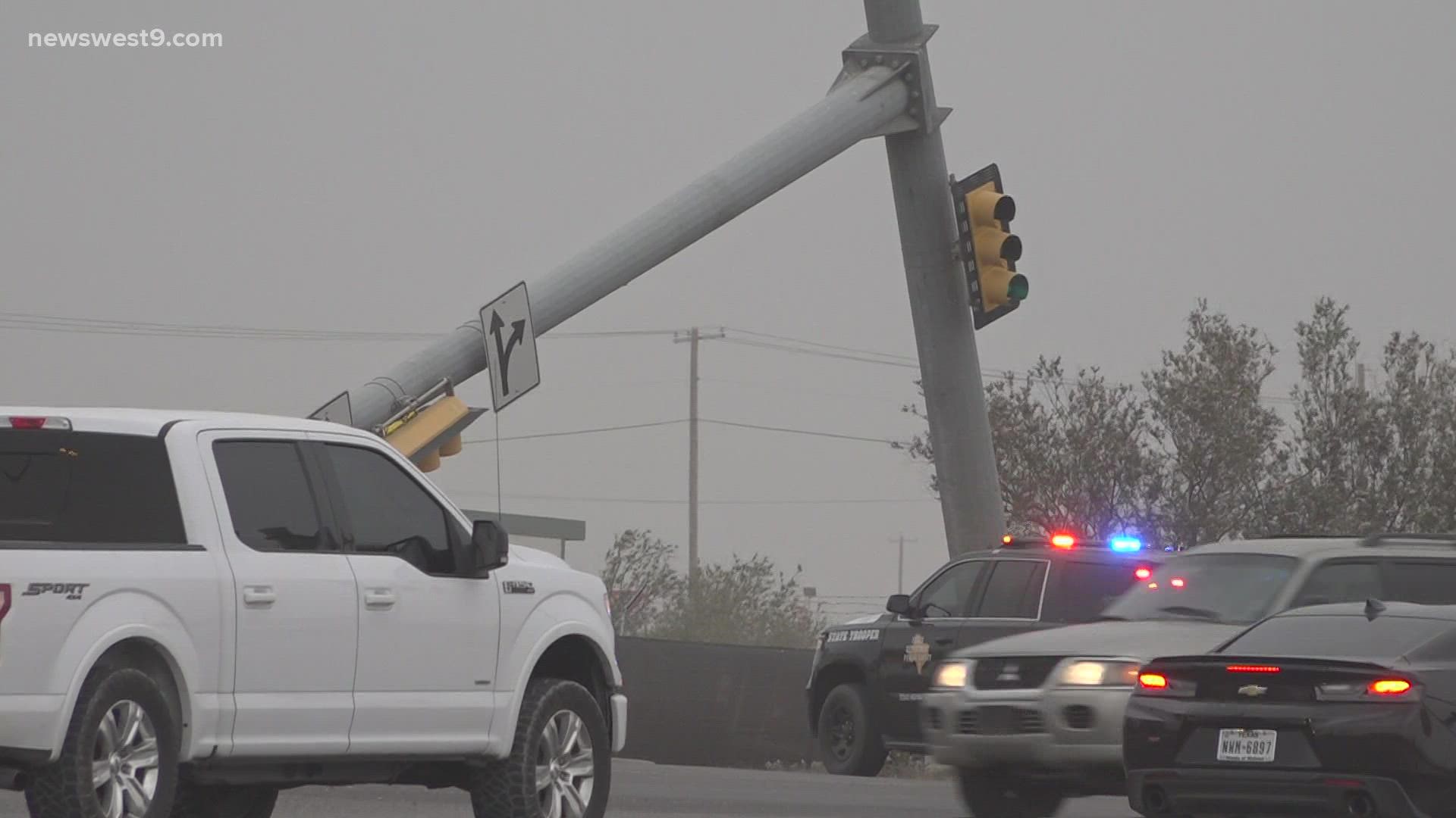The traffic light fell down Tuesday due to high winds in the area.