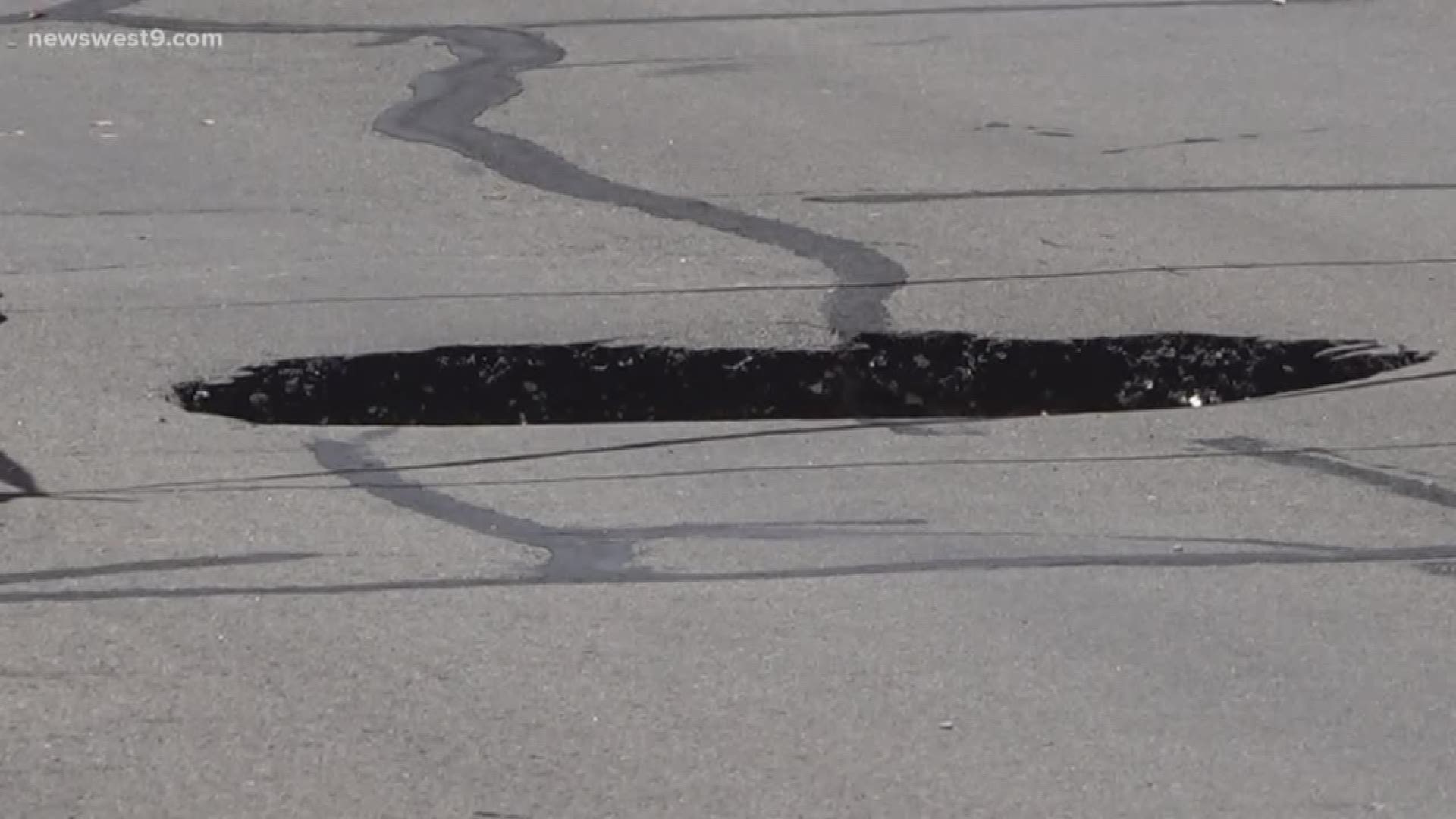 The pothole is affecting traffic in the eastbound lanes of Mockingbird
