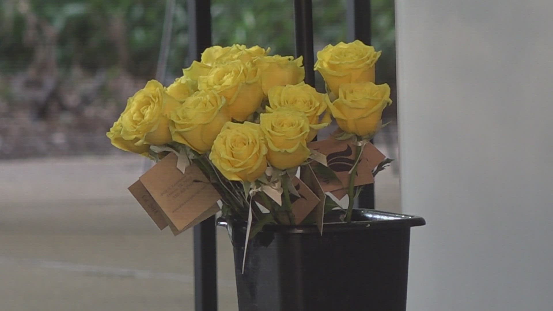 Seven seats were tied with yellow ribbon with a yellow flower placed on each chair in honor of the seven victims who lost their lives.