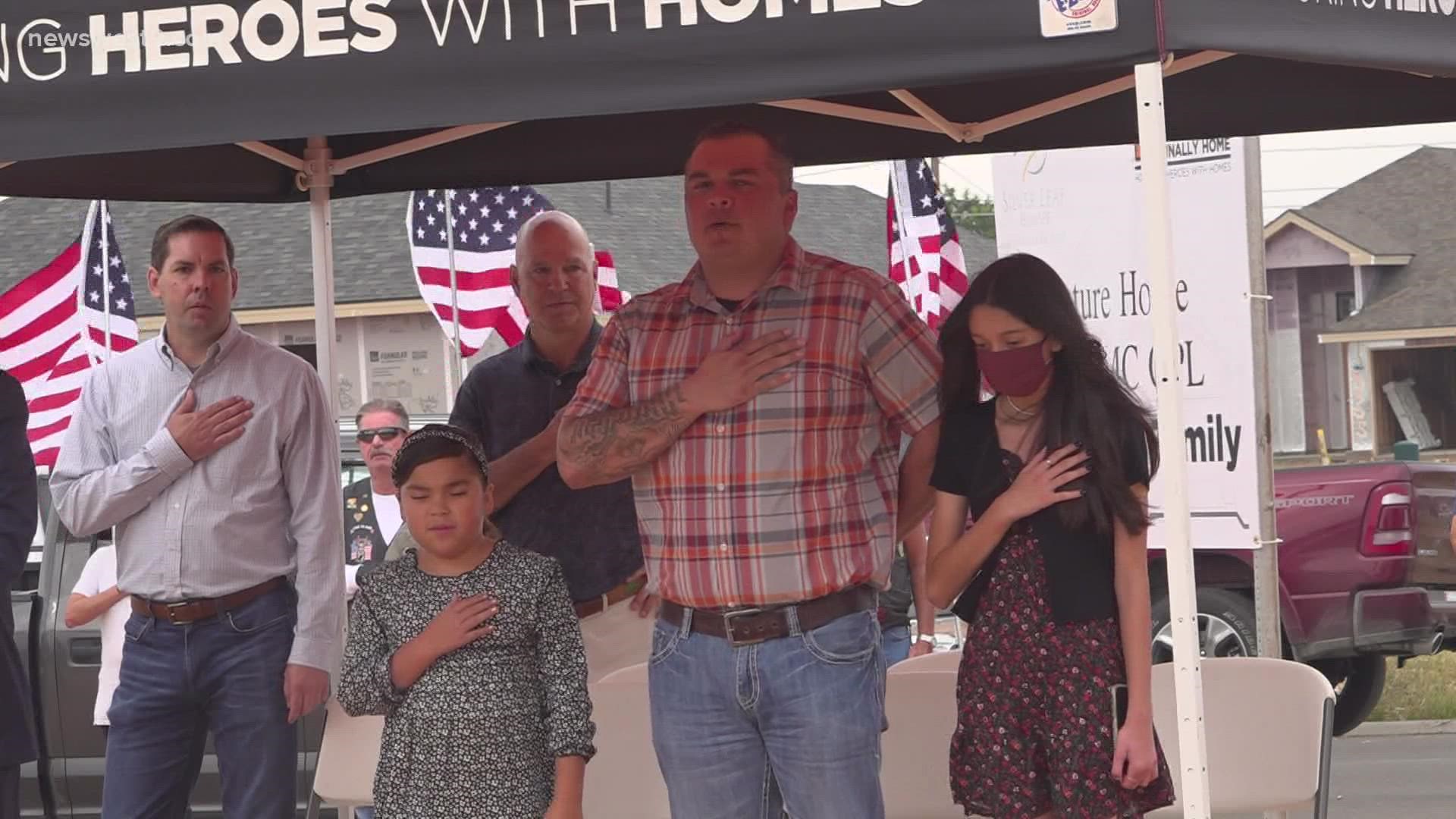 Operation FINALLY HOME and local builder, Silver Leaf Homes, surprised Ray Lopez and his two daughters.