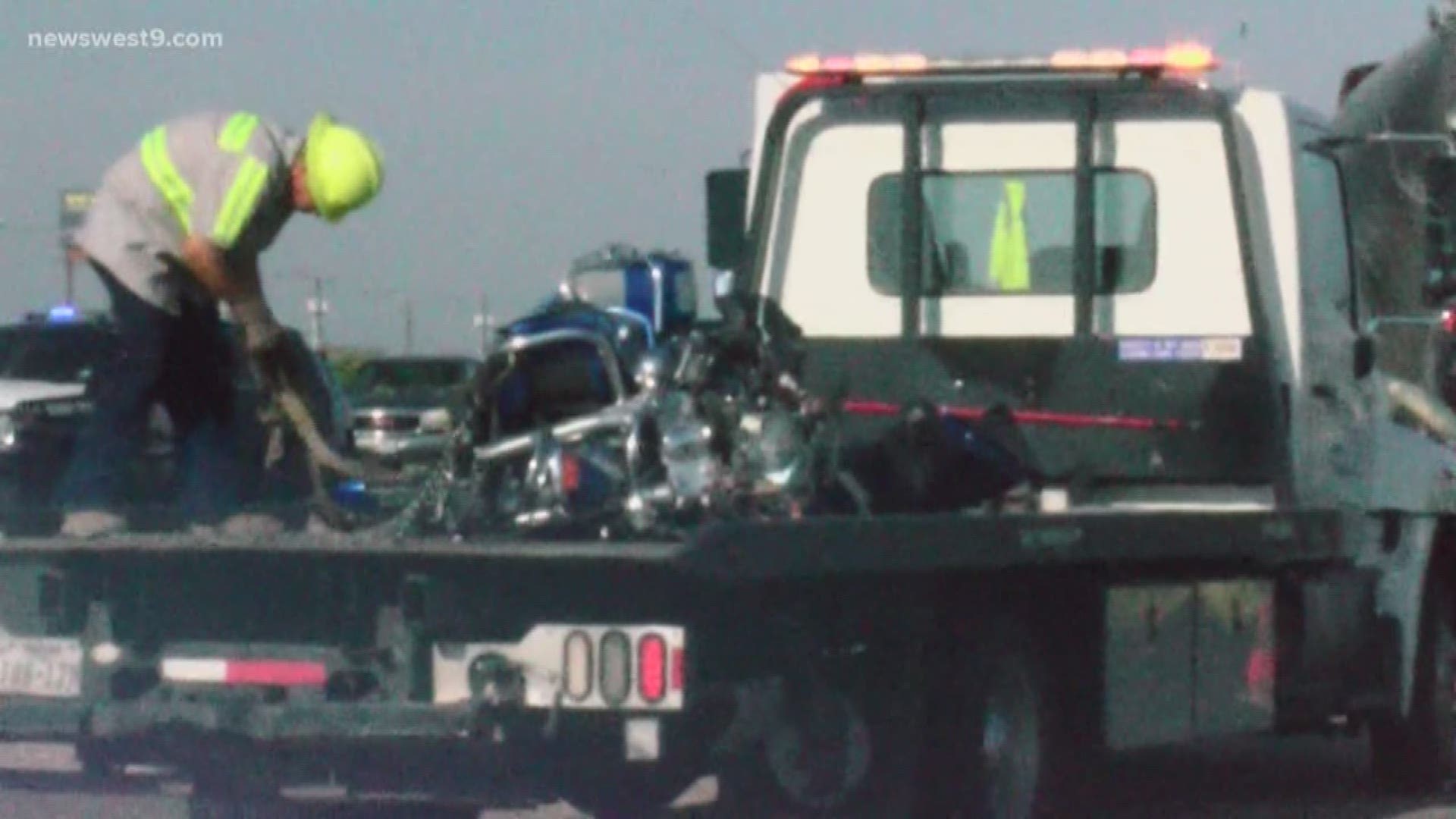 Authorities are working the scene of a major accident involving a motorcycle and an 18-wheeler