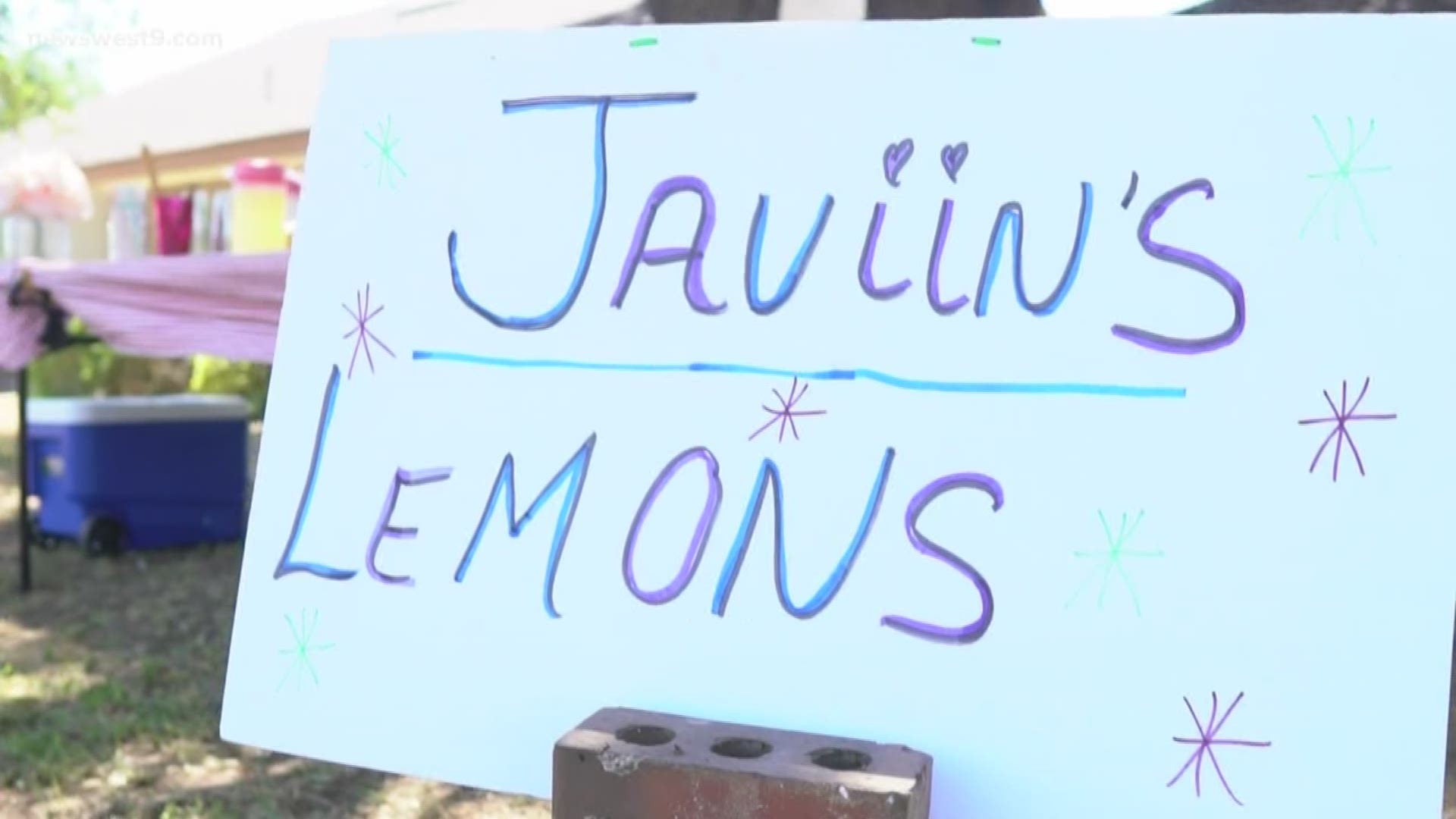 Javiin Mitchell has been pouring up lemonade for many thirsty residents in her community.