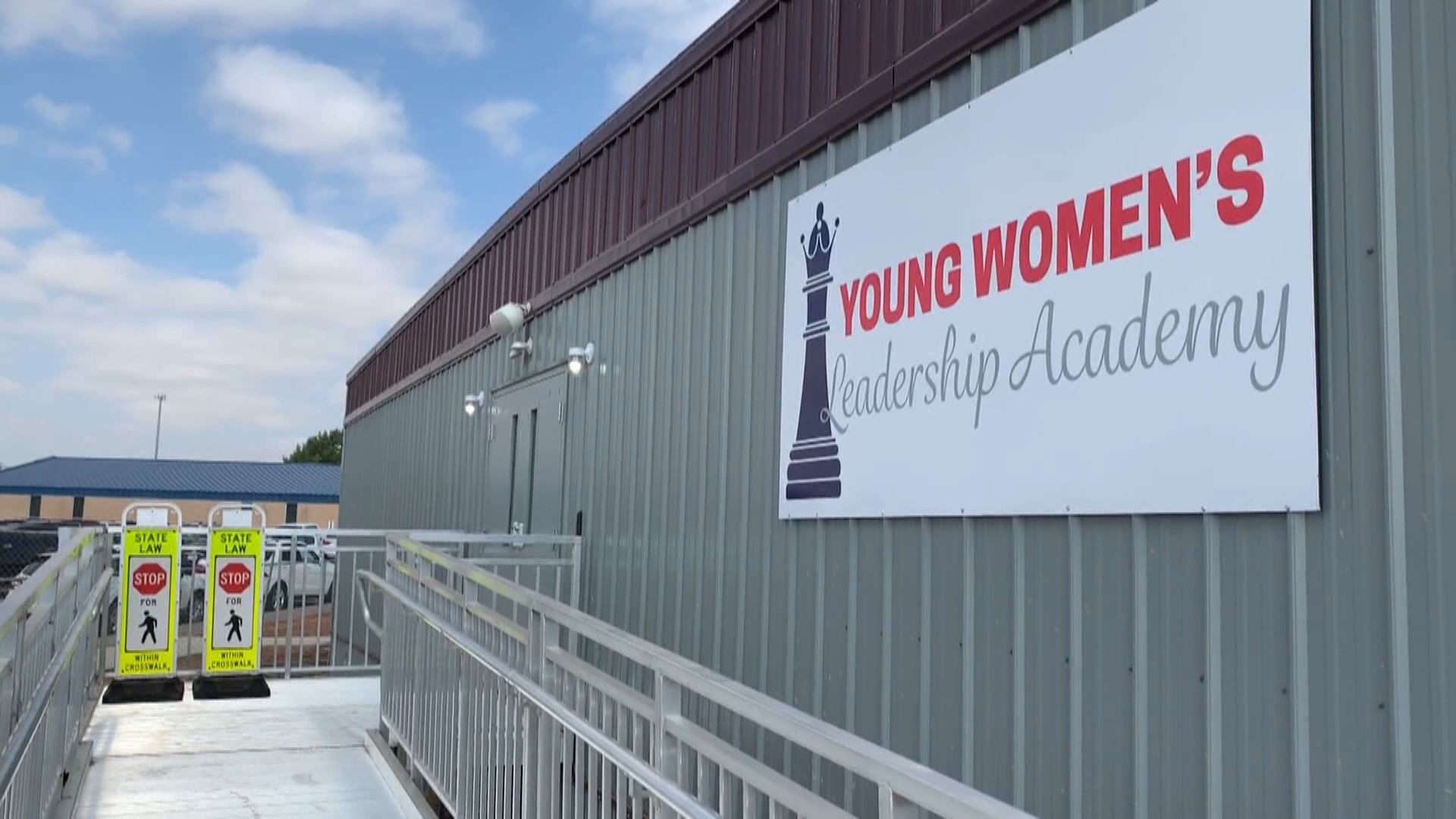 The board is considering two options for the Young Women's Leadership Academy. Keep the school at its location or transition students to Washington STEM Academy.