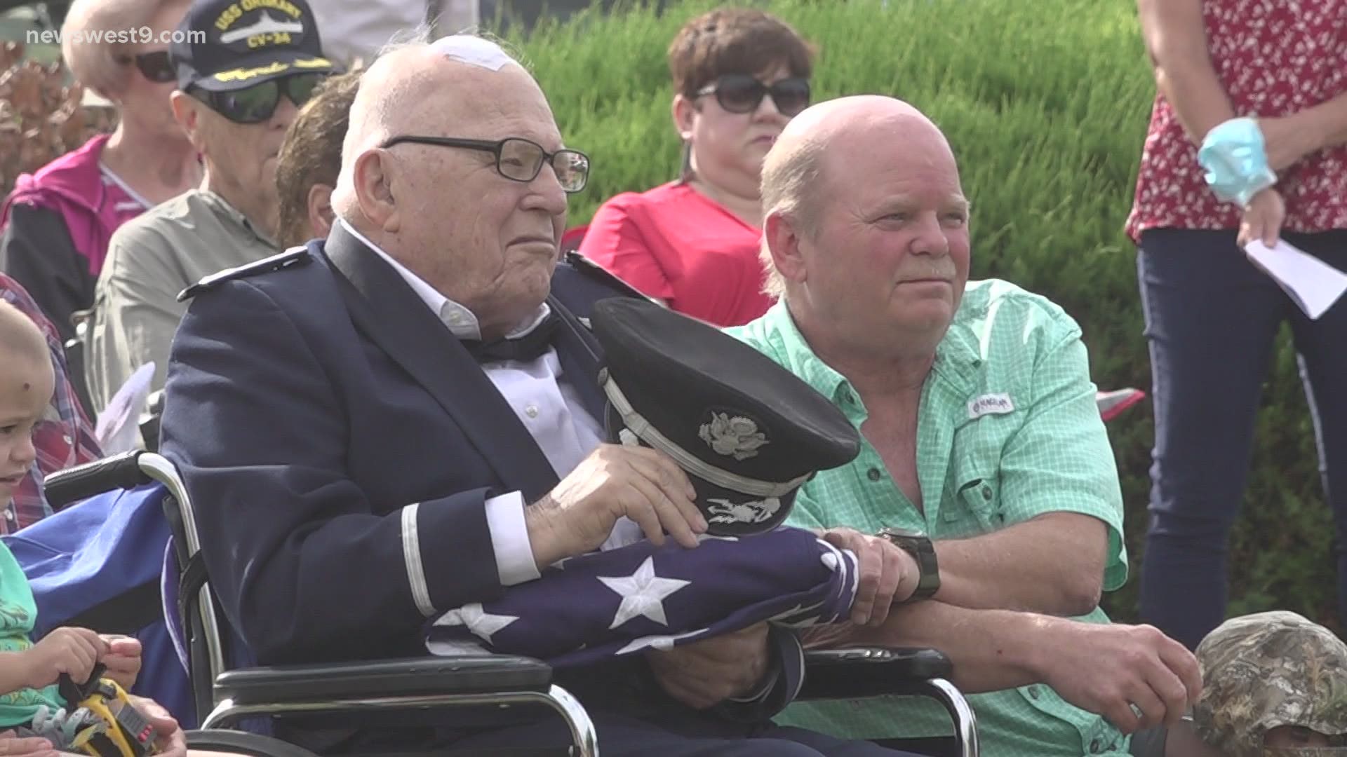 The Midland County Sheriff presented a folded flag to the most decorated veteran in Midland.
