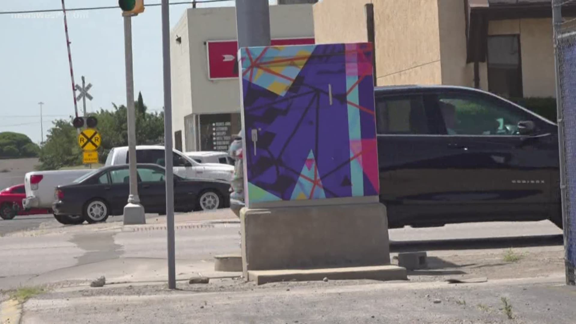 The city hopes to cover four more boxes with local art by the end of summer.