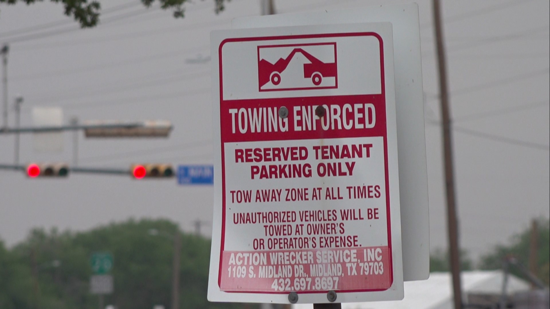 Towing signs need to be a certain height, size and color in order for a company to exercise a "legal tow".