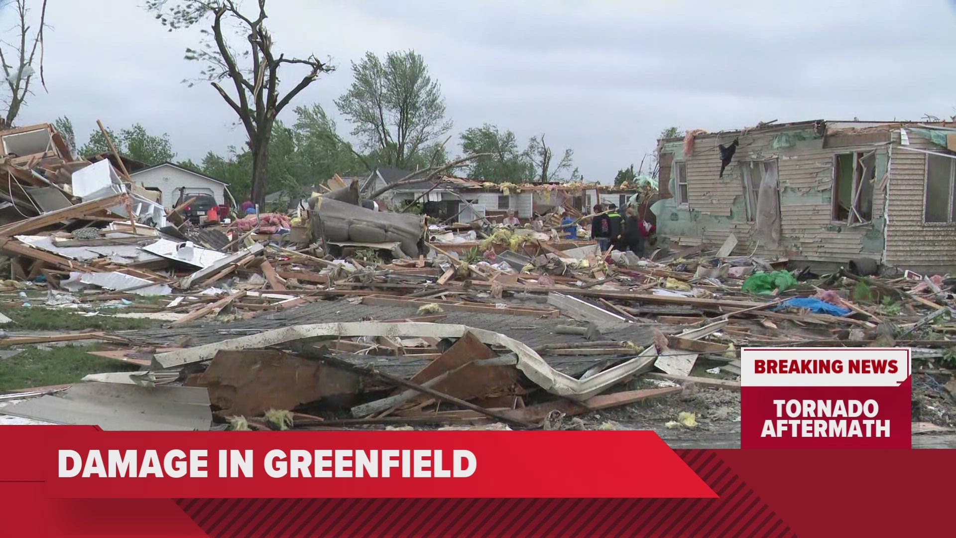 Though the house was completely leveled, neighbors were able to save one woman from the rubble left behind.